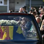 Queen Elizabeth II begins solemn final journey