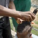 PHOTOS: Borno Hisbah shaves off youths' hair over 'anti-moral' hairstyles